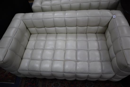 A pair of Josef Hoffmann Kubus ivory leather sofas W.150cm